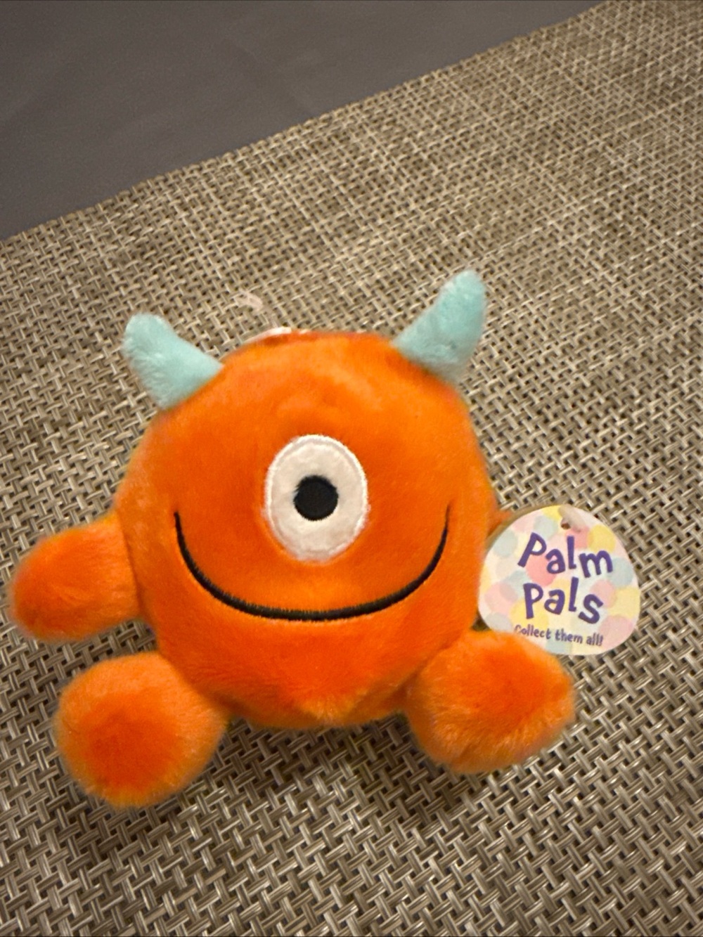 Palm Pals Orange One-Eyed Monster Plush